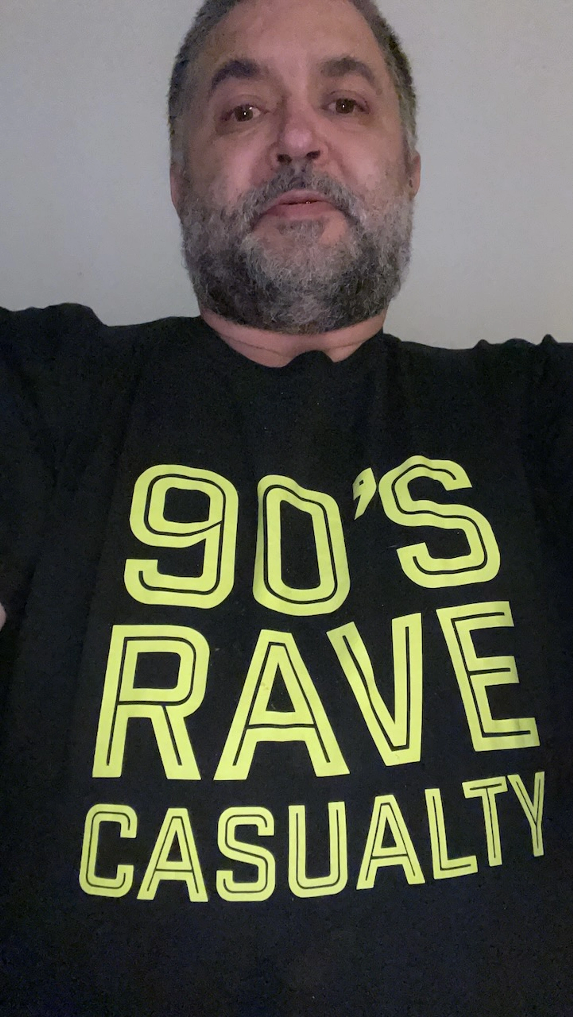 T-shirt with 90s Rave Casualty text