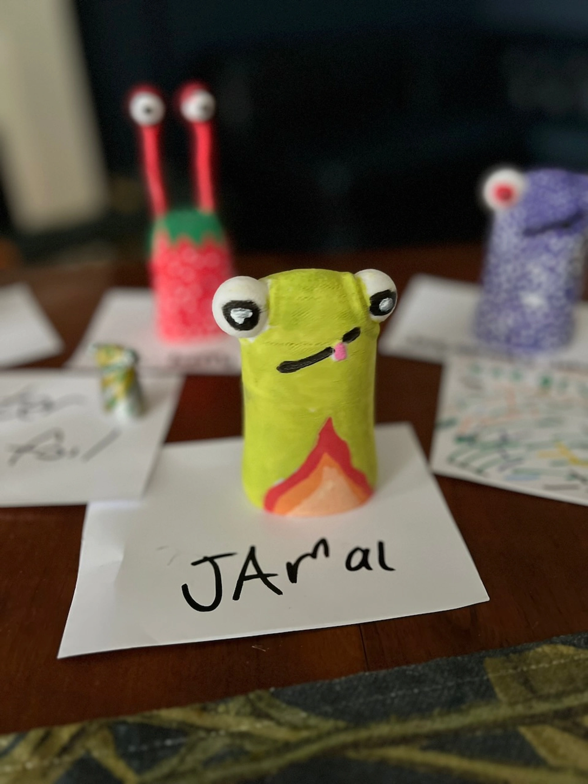 Green coloured Clyde figure named Jamal