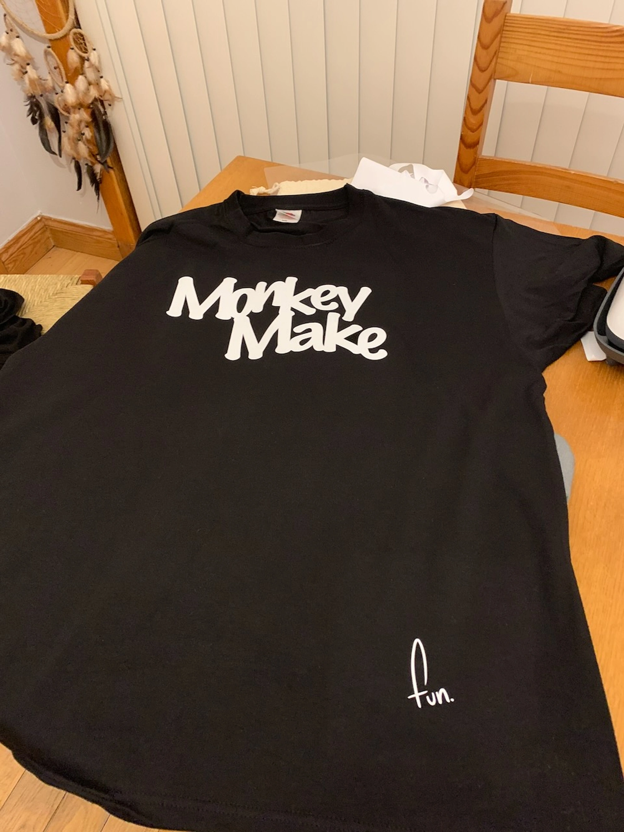 Black t-shirt with Monkey Make logo