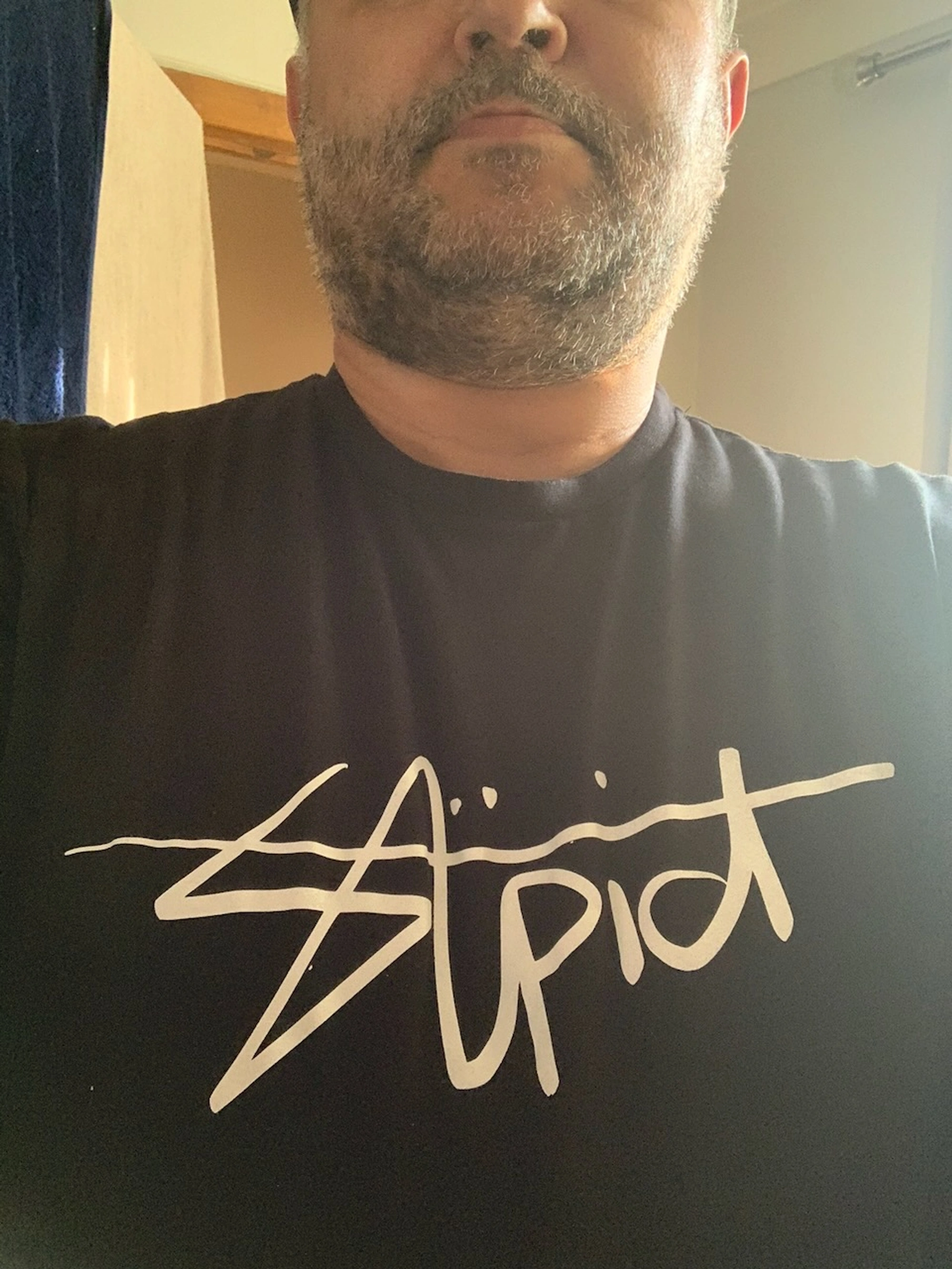 White t-shirt with Stupid text design